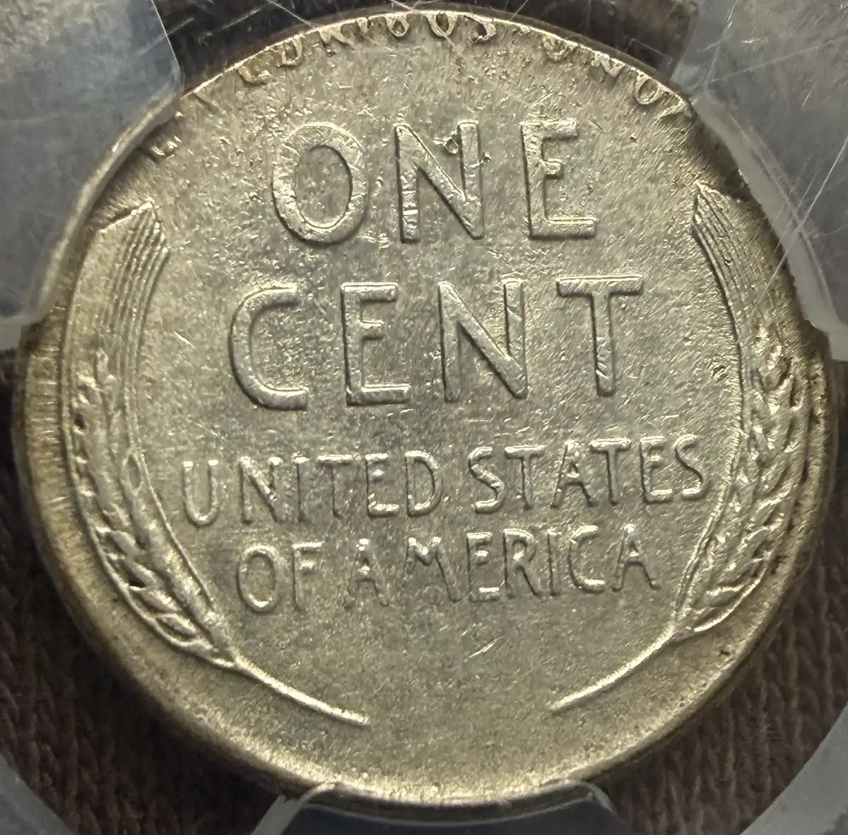 1951-Cent-Struck-On-10-Cent-Silver-Planchet