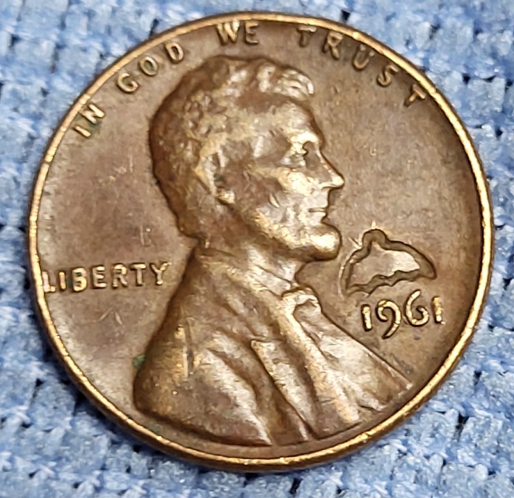 1961-Cent:-I've-Seen-A-Lot-Of-Pennies-With-Different-Emblems.-Counterstamps