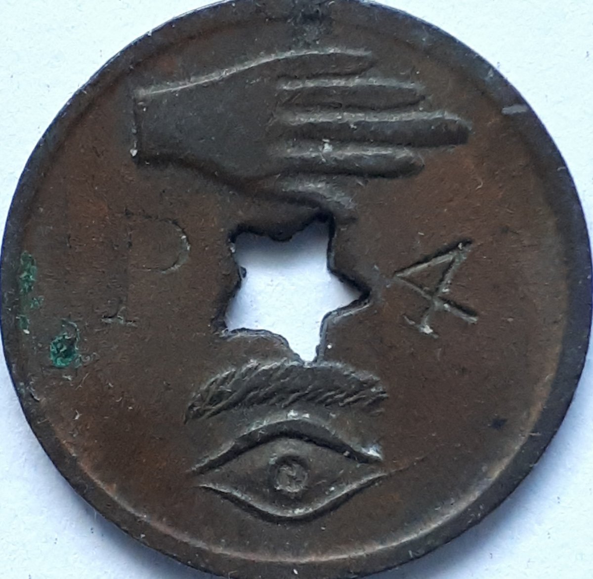 Identified:-Unknown-Token-With-Mystical-Symbols-On-It