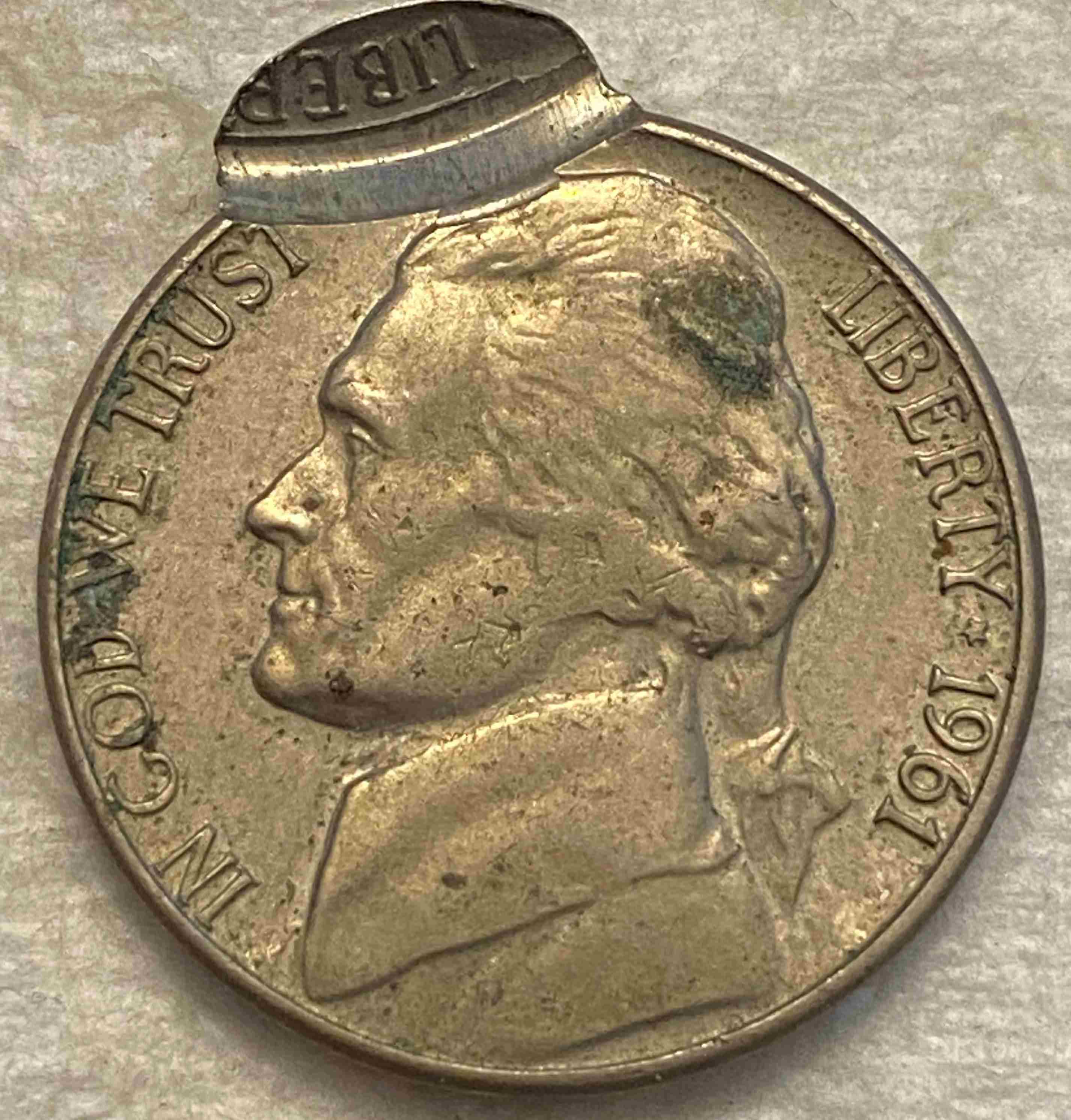 1961-D-Nickel---Cud-Or-Damage?