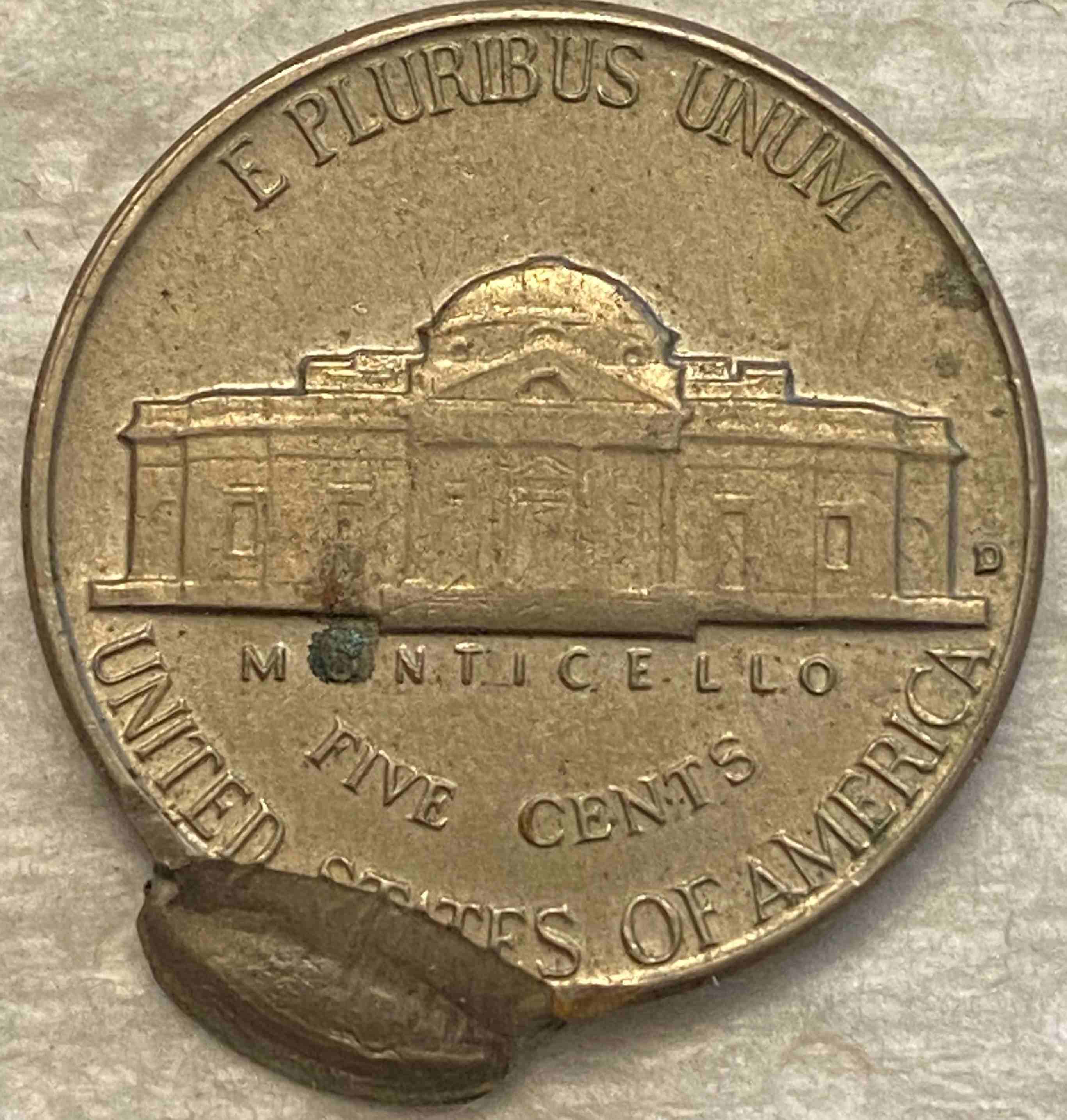 1961-D-Nickel---Cud-Or-Damage?