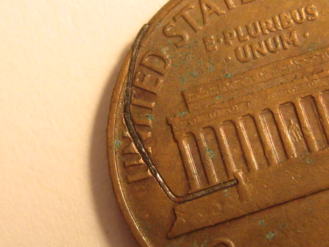 Lincoln-Memorial-Cent-Struck-Thru-Retained-Wire