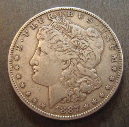 1887-Morgan-With-Cross-On-Eagle-Chest.-Any-Ideas?