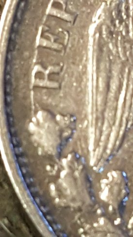 1899-Mexico-Un-Peso.-Die-Cracks-All-Over-OBV-&-Rev.-NE-Significance/-Worth?