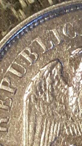 1899-Mexico-Un-Peso.-Die-Cracks-All-Over-OBV-&-Rev.-NE-Significance/-Worth?