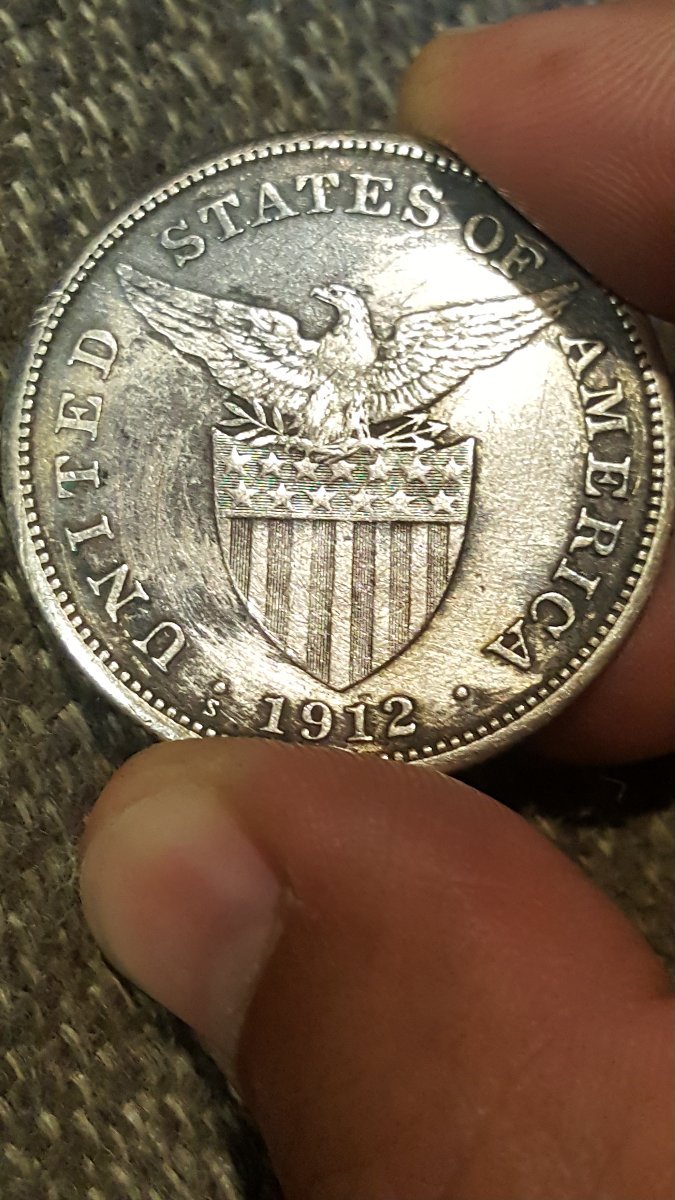 1912-S-Phillipines-One-Peso.-Looks-To-Have-Been-Cleaned.-Still-Worth?