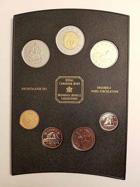 Breaking-Open-A-Plastic-RCM-Coin-Holder