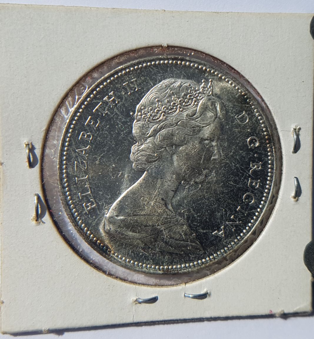 1966-Dollar-Dot-Under-Feather?