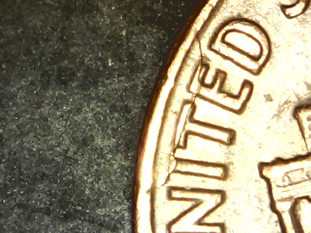 1972-D-LMC-Struck-Thru-Foil-Or-Fold-Over-Rev