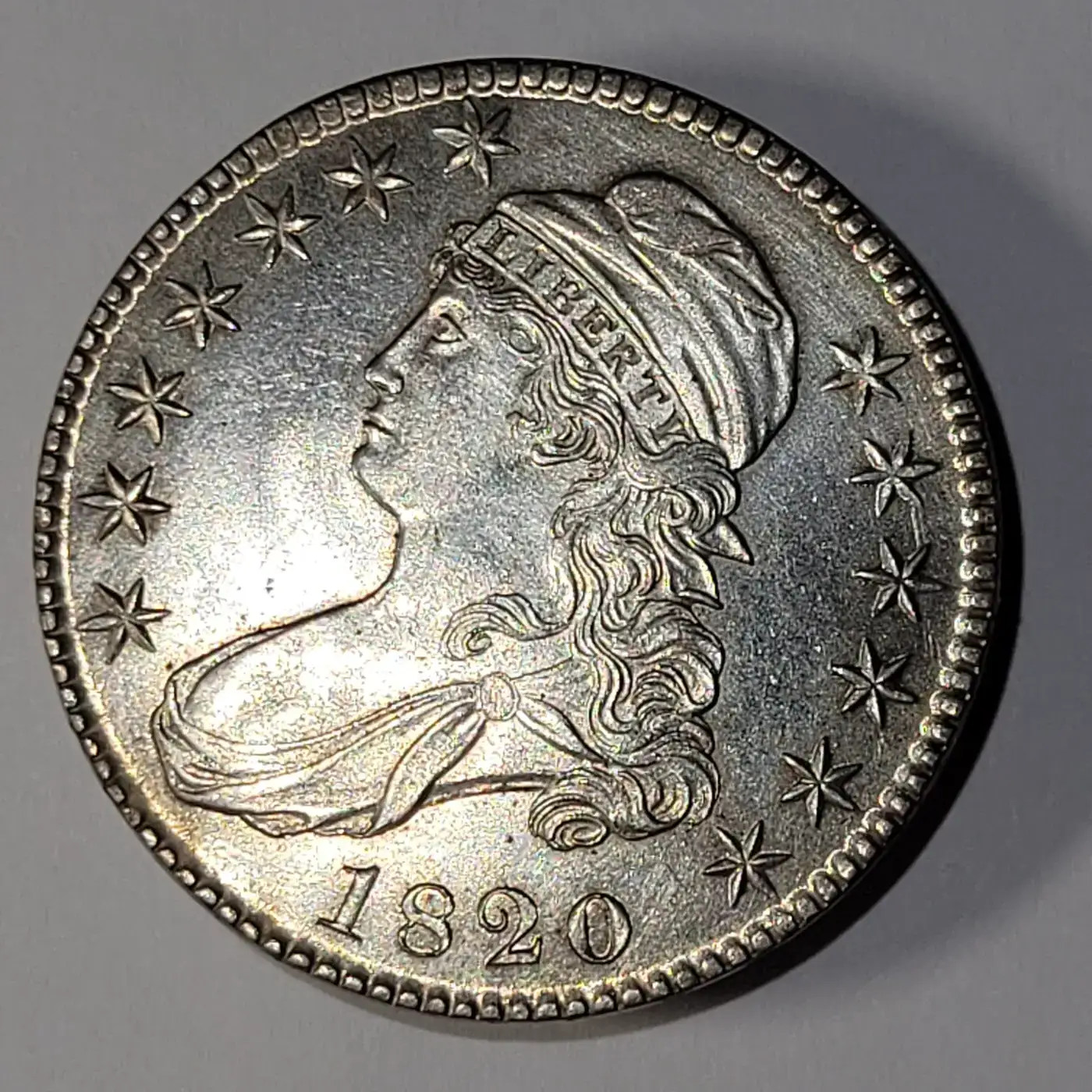 Counterfeit-1820-Capped-Bust-Half