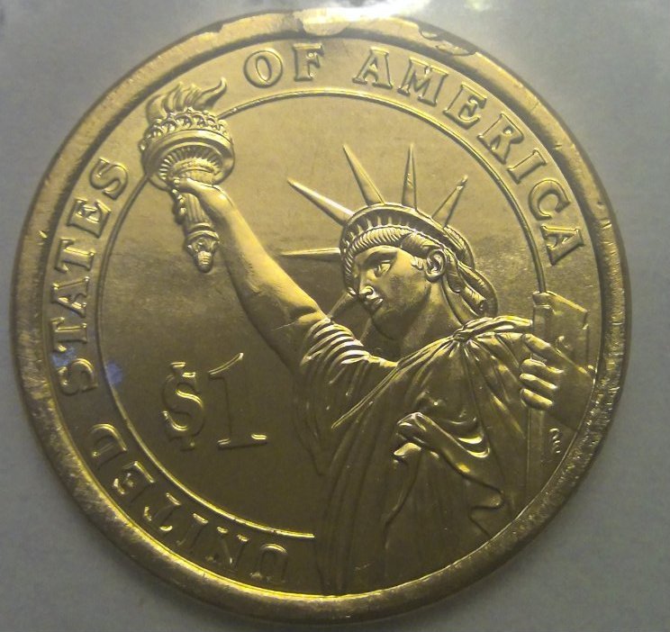 George-H.-W.-Bush-Dollar-Coin-With-Die-Damage