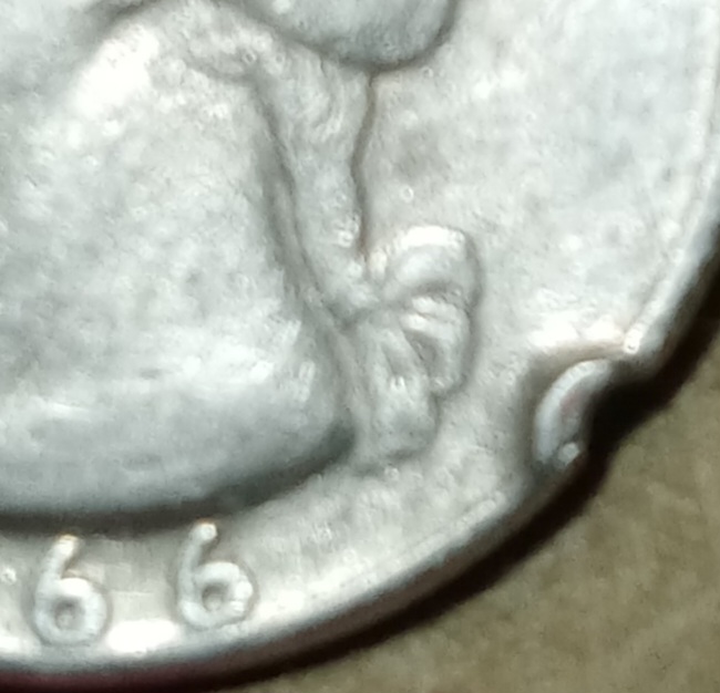Found-A-Very-Interesting-ErrorS-On-A-1966-Quarter-With-No-Mint-Mark.