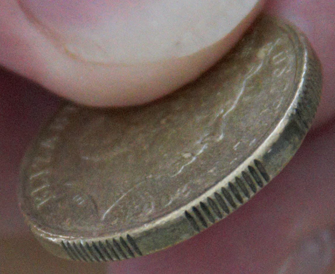 2003-$1---PMD-Or-Rim/Strike-Error?