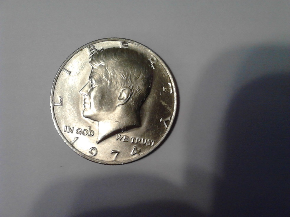 US-Quarter-Inside-Of-Kennedy-Half