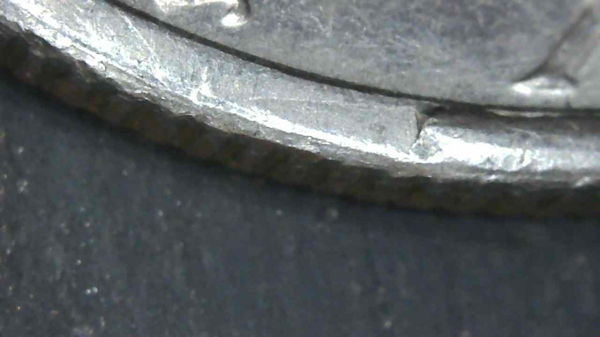 1973-D-Kennedy-Half-Dollar-With-Extra-Rim-Piece?