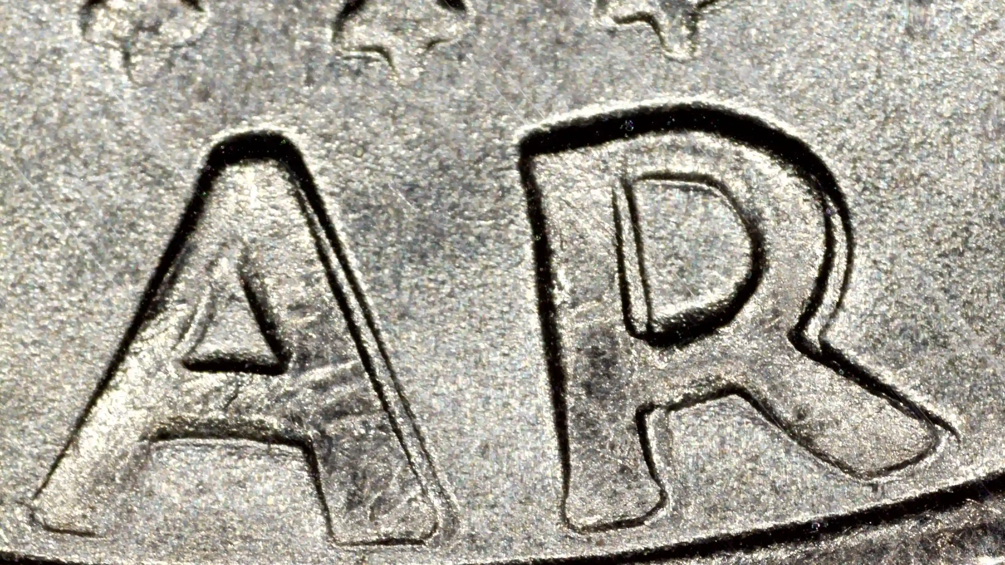 1977-D-Kennedy-Half-Dollar-Reverse-Lettering