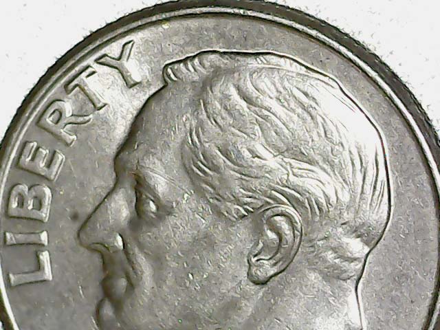 1997-D-Dime-With-Something-Imbedded-In-It?