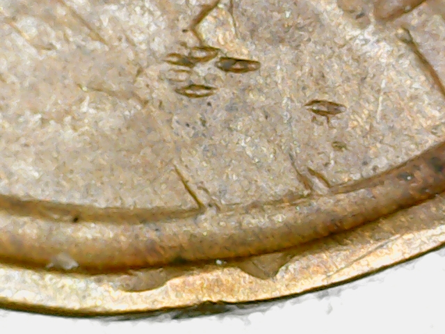 1909-Lincoln-Penny-With-Twisted-Rim,-Gas-Bubbles,-Multiple-Wheat-Stems