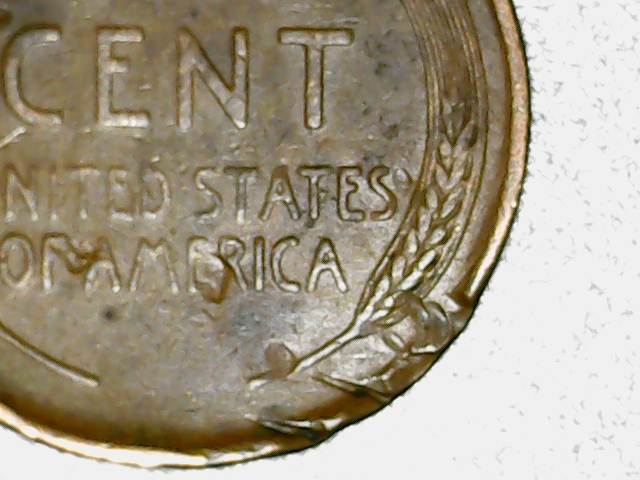 1909-Lincoln-Penny-With-Twisted-Rim,-Gas-Bubbles,-Multiple-Wheat-Stems