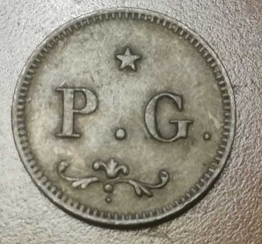 A-Small-Token-With-Letters-P.-G.