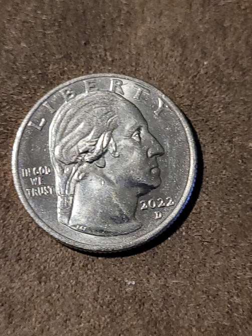 2022-D-Sally-Ride-Quarter-Error-Under-Bottom-Lip?