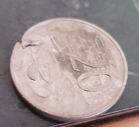 Real-Or-Fake---20c-1996-Lamination-Error-Crack