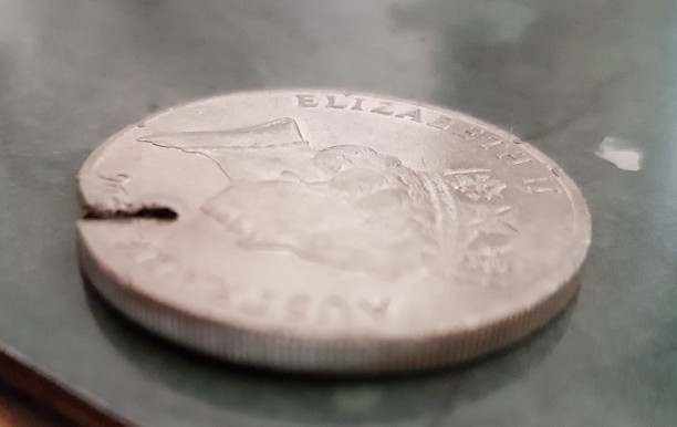 Real-Or-Fake---20c-1996-Lamination-Error-Crack