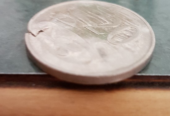 Real-Or-Fake---20c-1996-Lamination-Error-Crack