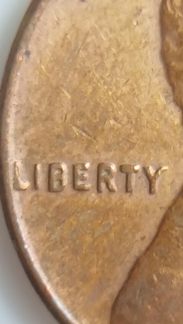 Lincoln-Cent-1961-D-Checking-For-Repunched-And-Doubling.