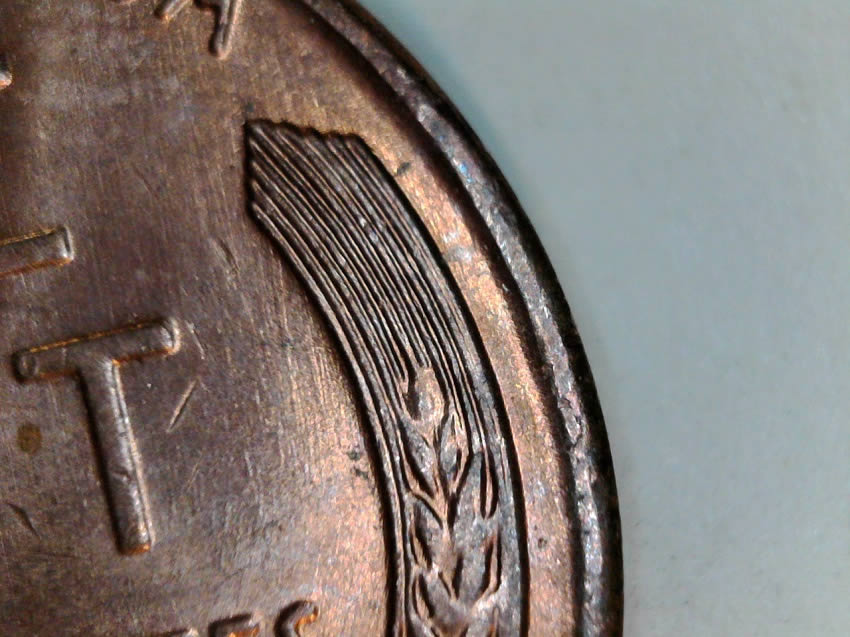 1957-D-Cent-Clipped-Planchet-With-Blakesly-Effect