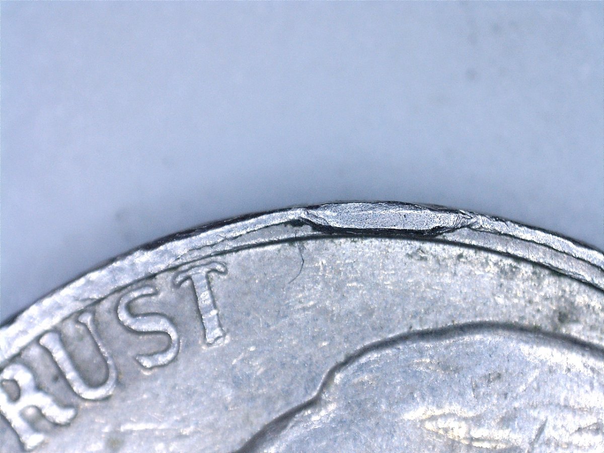 Possible-Cud-On-1975-D-Jefferson-Nickel?