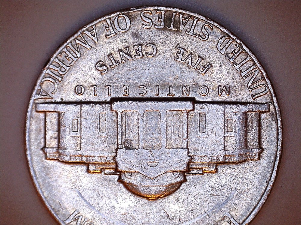 Possible-Cud-On-1975-D-Jefferson-Nickel?