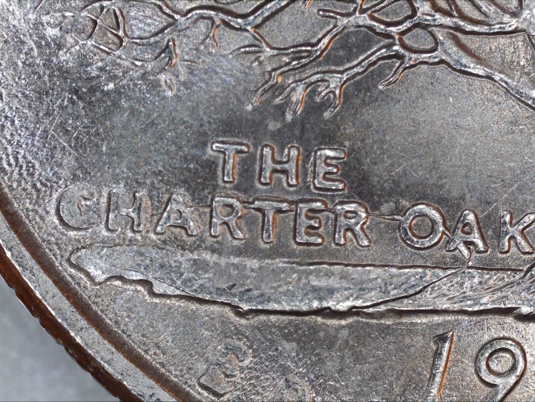 Large-I-Think-Circular-Die-Crack-On-Connecticut-Quarter