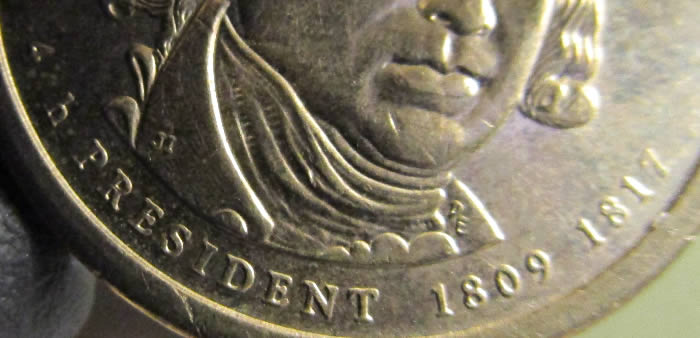 James-Madison-Pres.-Dollar-Struck-Through-Grease