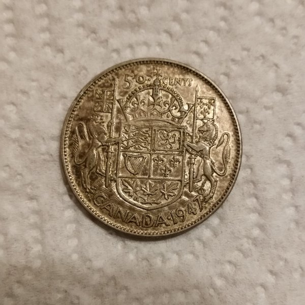Collection-Hunt:-1947-Canadian-50-Cent-Piece-For-Grading