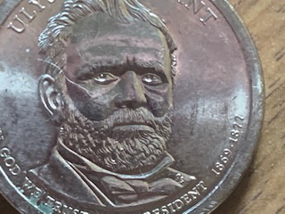 1-Dollar-Gold-Coin-With-Real-Looking-Eyes-2011