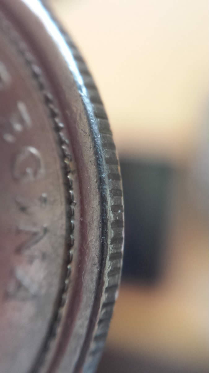 Big-Fat-Rim-On-This-2005-Quarter,-Squished-Beads,-Mint-Error-Or-PMD