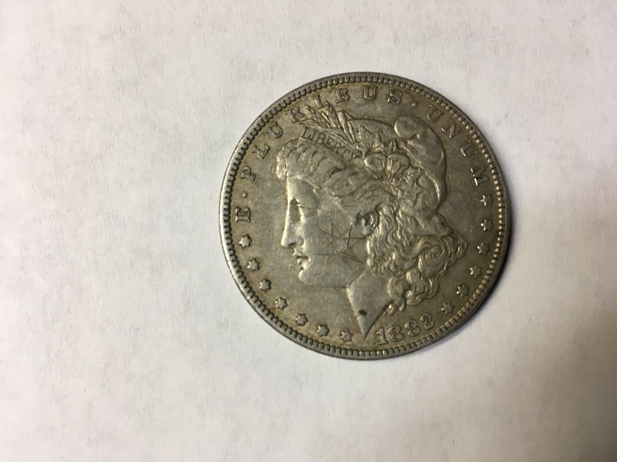 Wondering-If-I-Have-A-1882-Morgan-With-Chop-Marks.