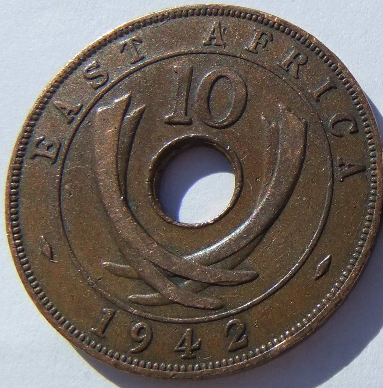 Holes-In--The-Coins-Origins