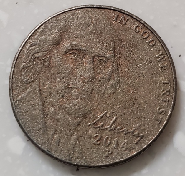 Is-This-2014-P-Nickel-Some-Kind-Of-Error,-Or-Just-Really-Messed-Up?