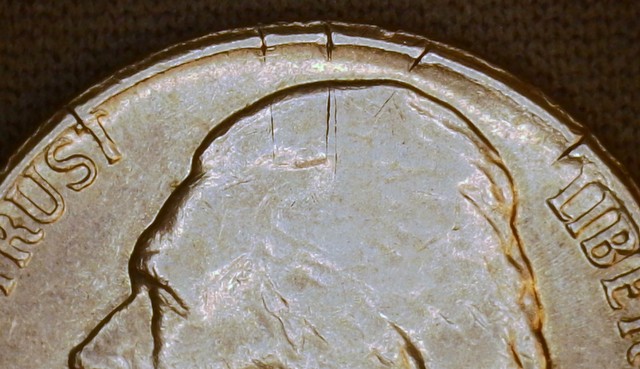 1985-P-Nickel,-Defective-Planchet-Or-PMD?