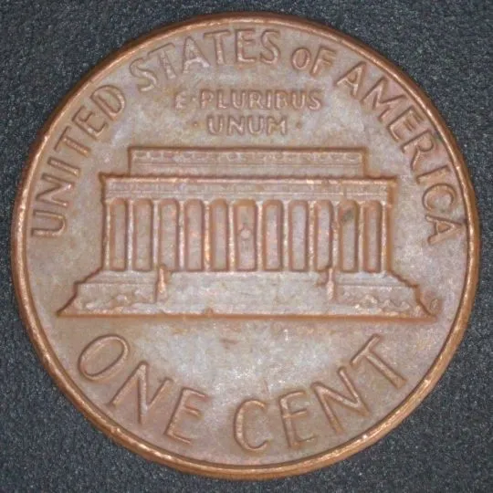 1977-LMC-Penny-/-Struck-Thru-Foil.-Retained-Break,-Or-Fin-Fold-Over?