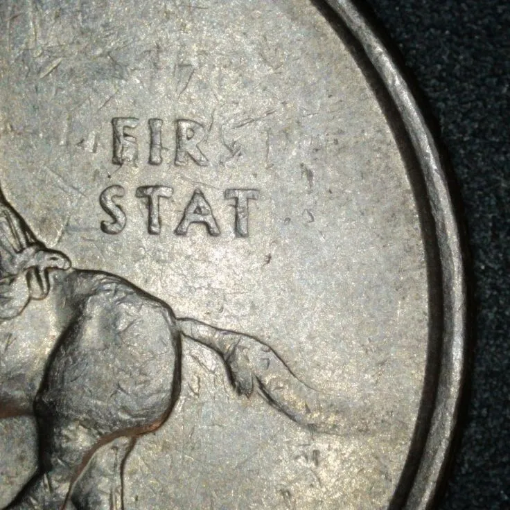 1999-P-Delaware-Quarter-/-Struck-Through-A-Lot-Of-Grease