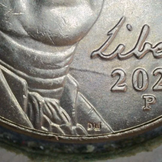 2023-P-Nickel-With-Long-Die-Dent.