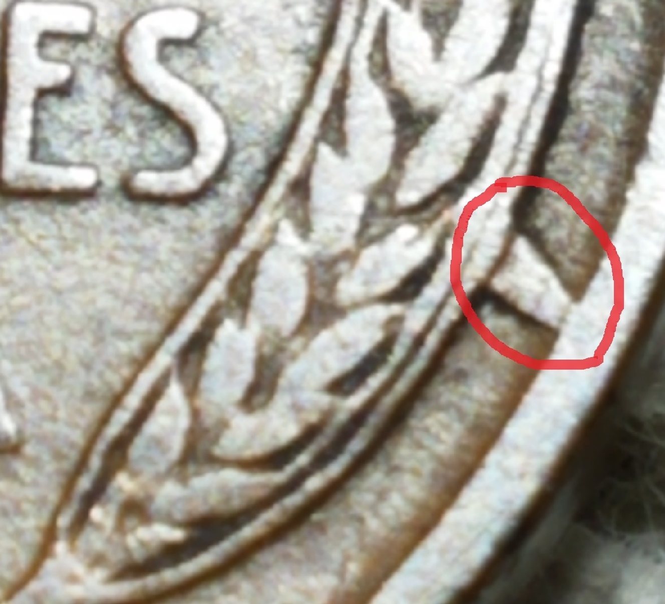 1909-Lincoln-Cent-With-A-Raised-Metal-Bridge-Connecting-Wheat-To-Rim