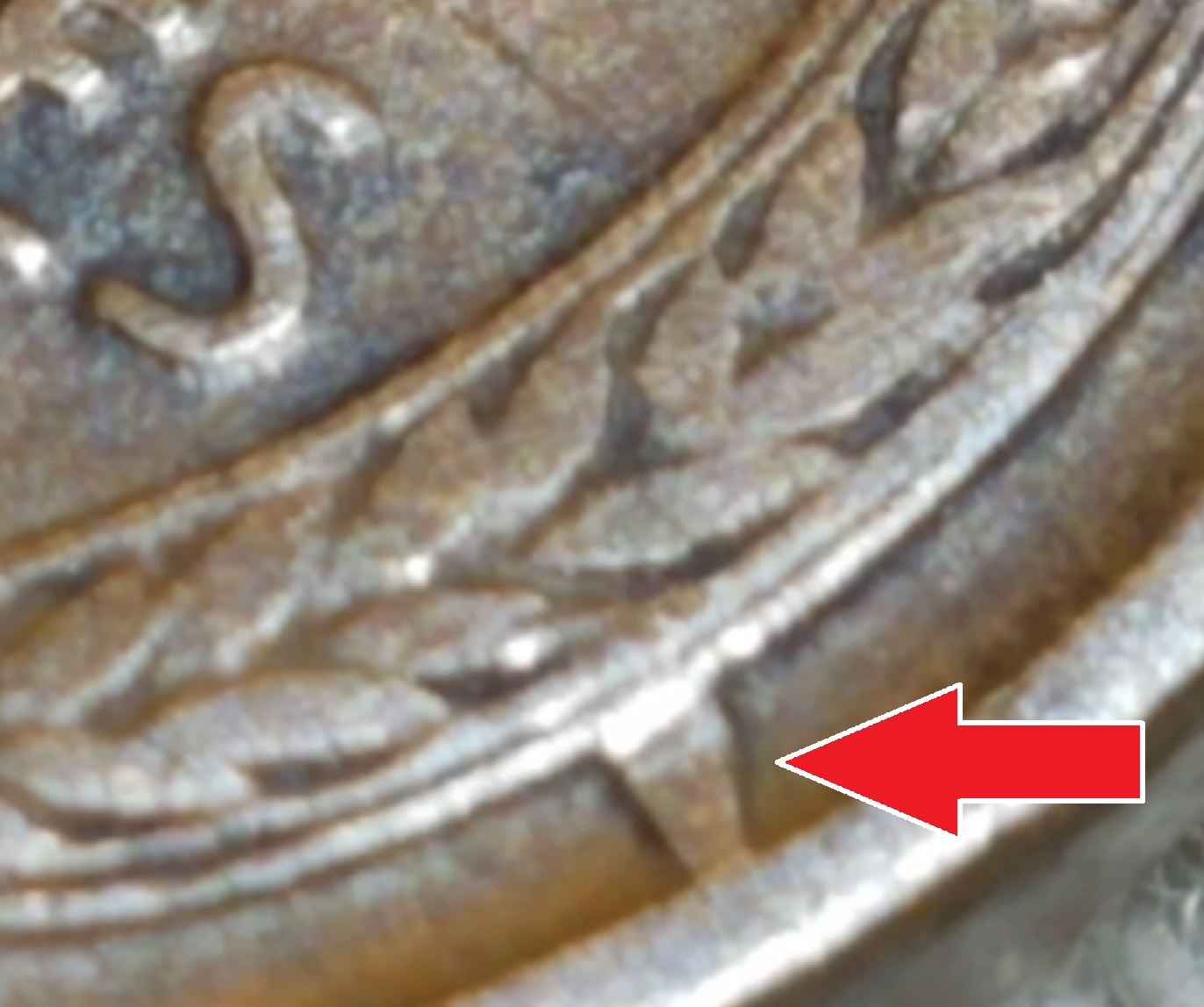 1909-Lincoln-Cent-With-A-Raised-Metal-Bridge-Connecting-Wheat-To-Rim