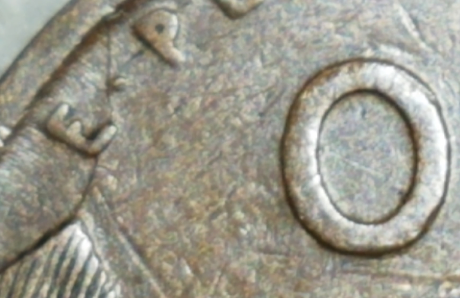 1909-Lincoln-Cent-With-A-Raised-Metal-Bridge-Connecting-Wheat-To-Rim