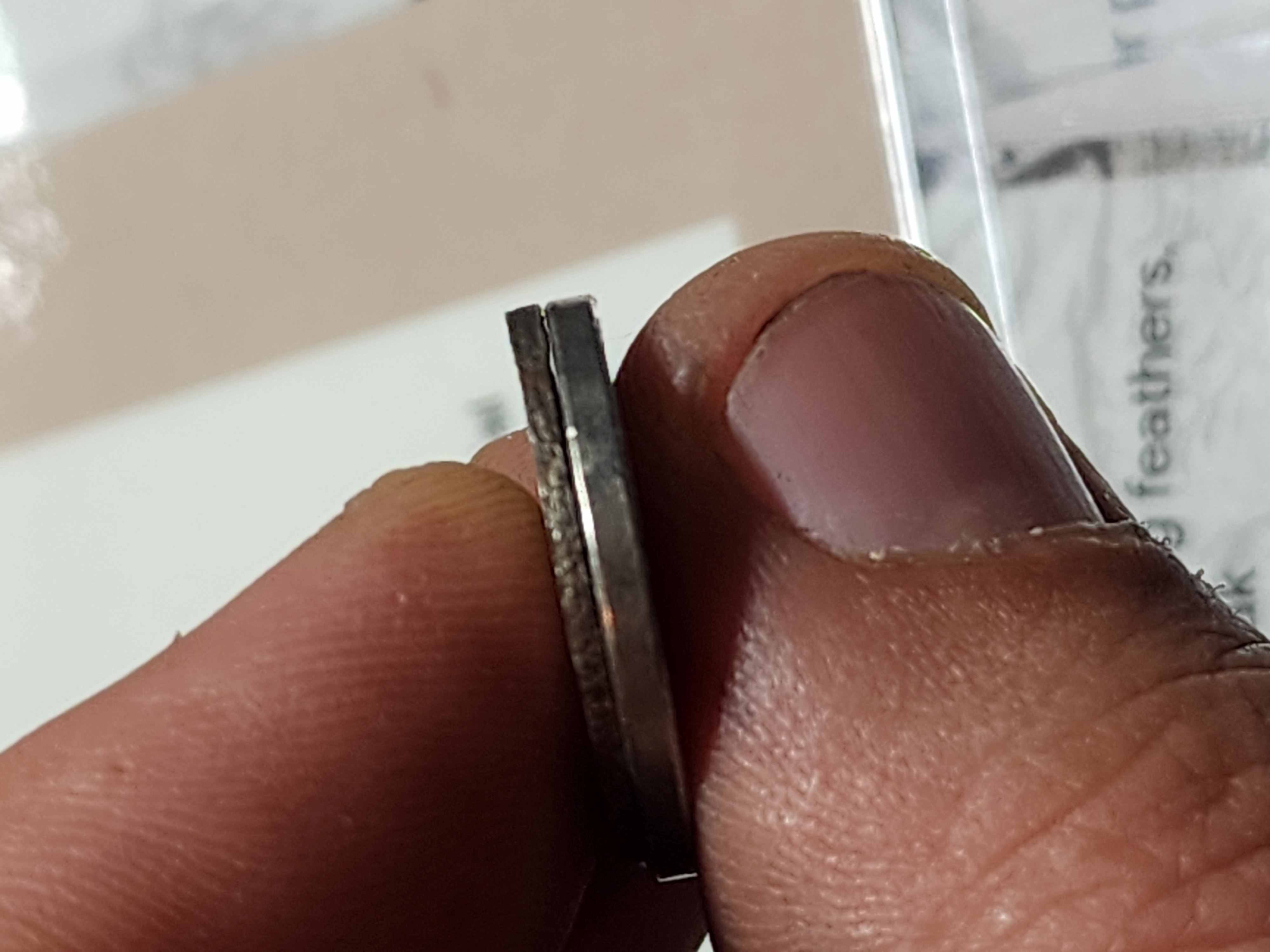 Parking-Lot-Condition-Nickel-Weighing-3.2-Grams-Really-Thin