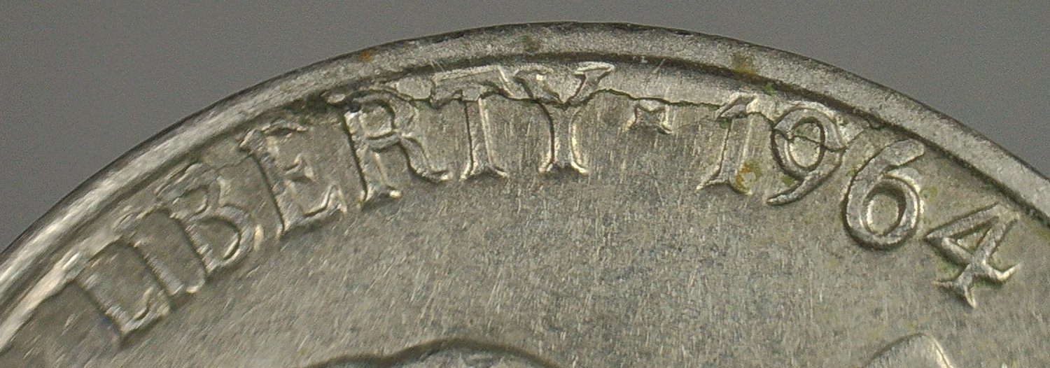 1964-D-Nickel-Delamination-Crack
