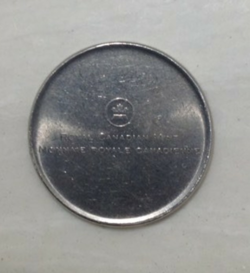 2011-Loonie-Silver-Coloured-With-RCM-Logo-On-Obverse...-ID-Please?